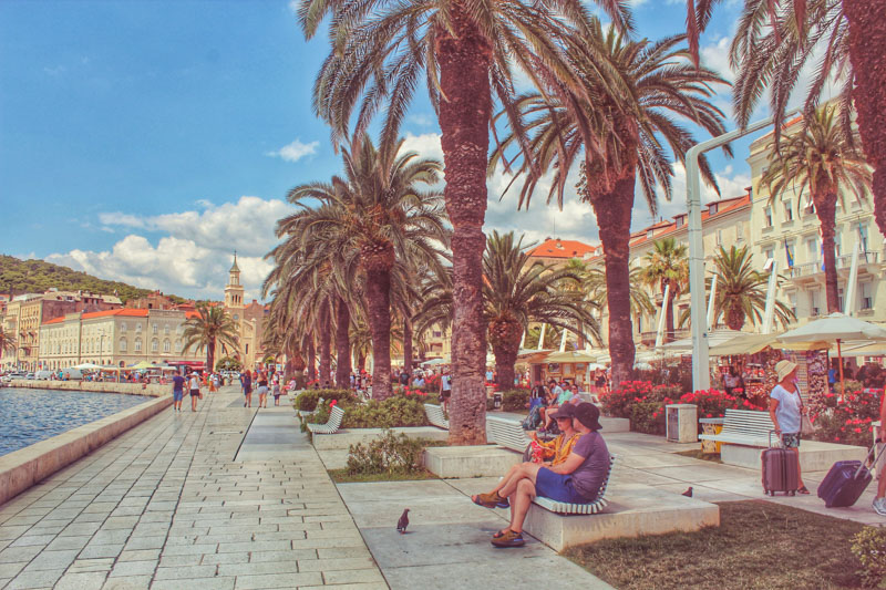 Stroll Riva Promenade, lined with palm trees, for coffee or ice cream, especially stunning at sunset.